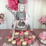 Stacked cake with cupcake tower