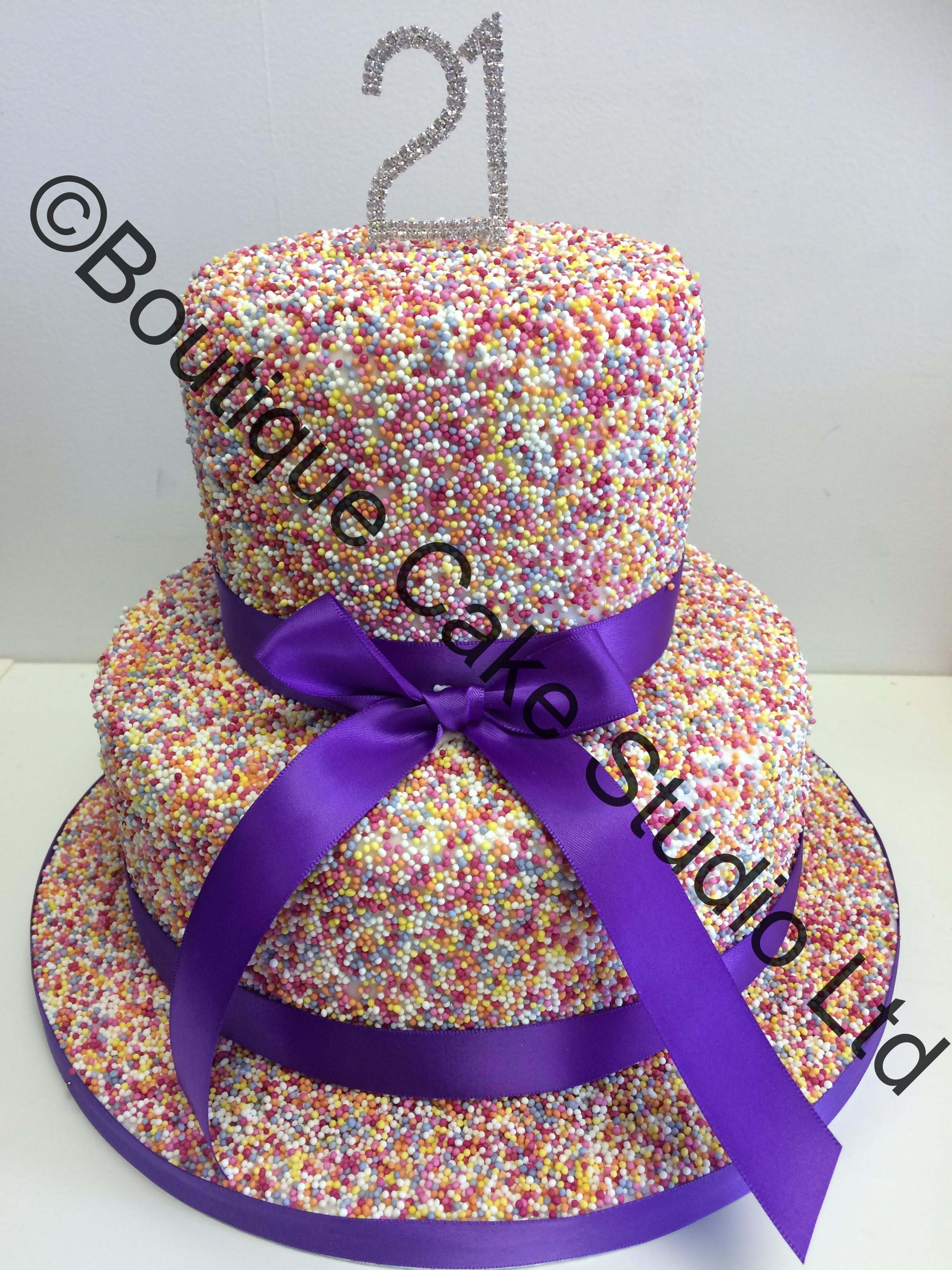 Sprinkle covered stacked cake