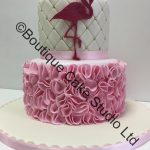Stacked Flamingo Cake with petal ruffle and trellis