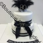 Black and White stacked cake with feathers