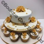 Golden Wedding Cake with Cupcakes