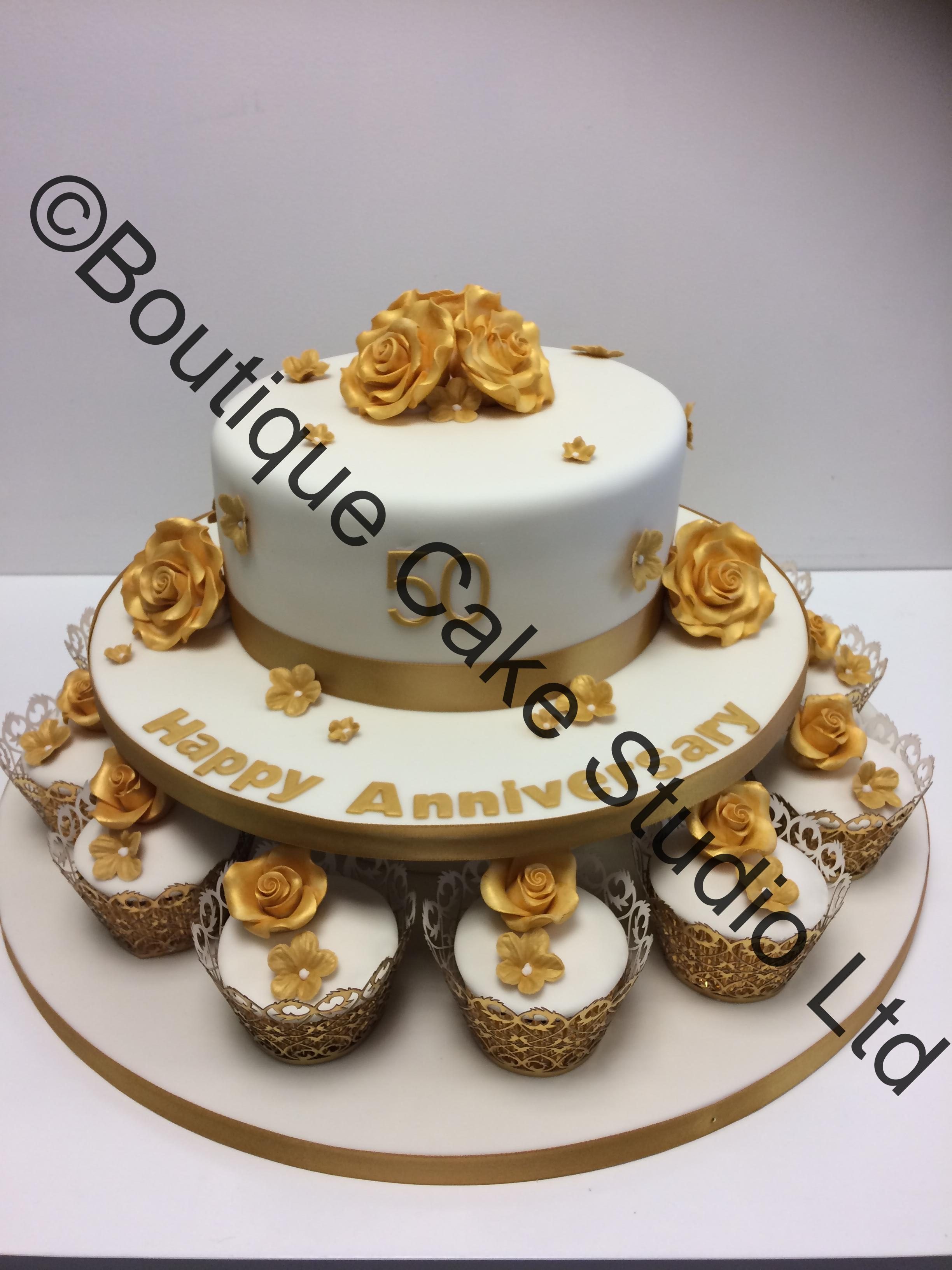 Golden Wedding Cake with Cupcakes