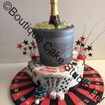 Casino themed stacked cake with ice bucket