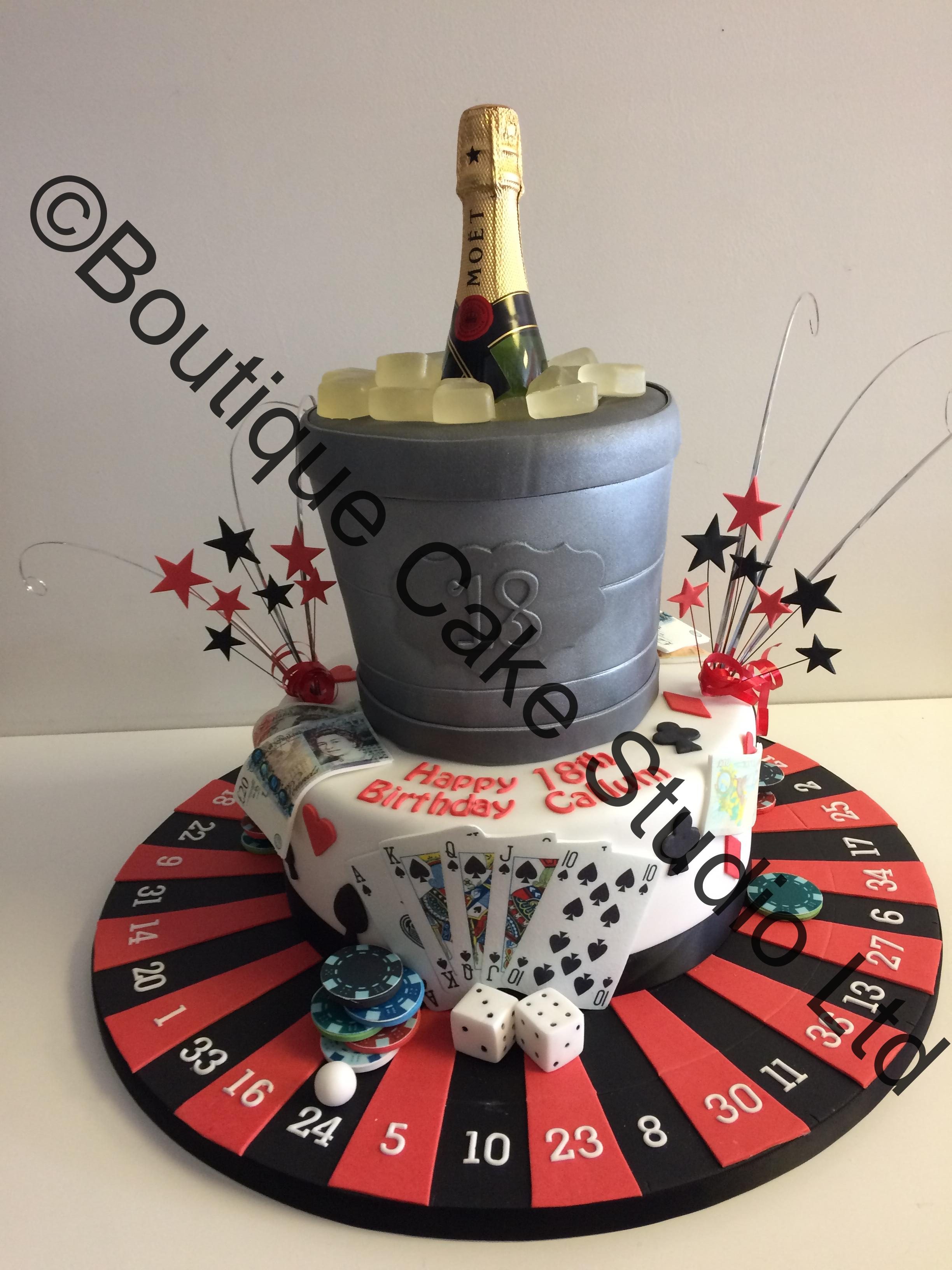 Casino themed stacked cake with ice bucket