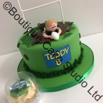 Rugby themed cake with model