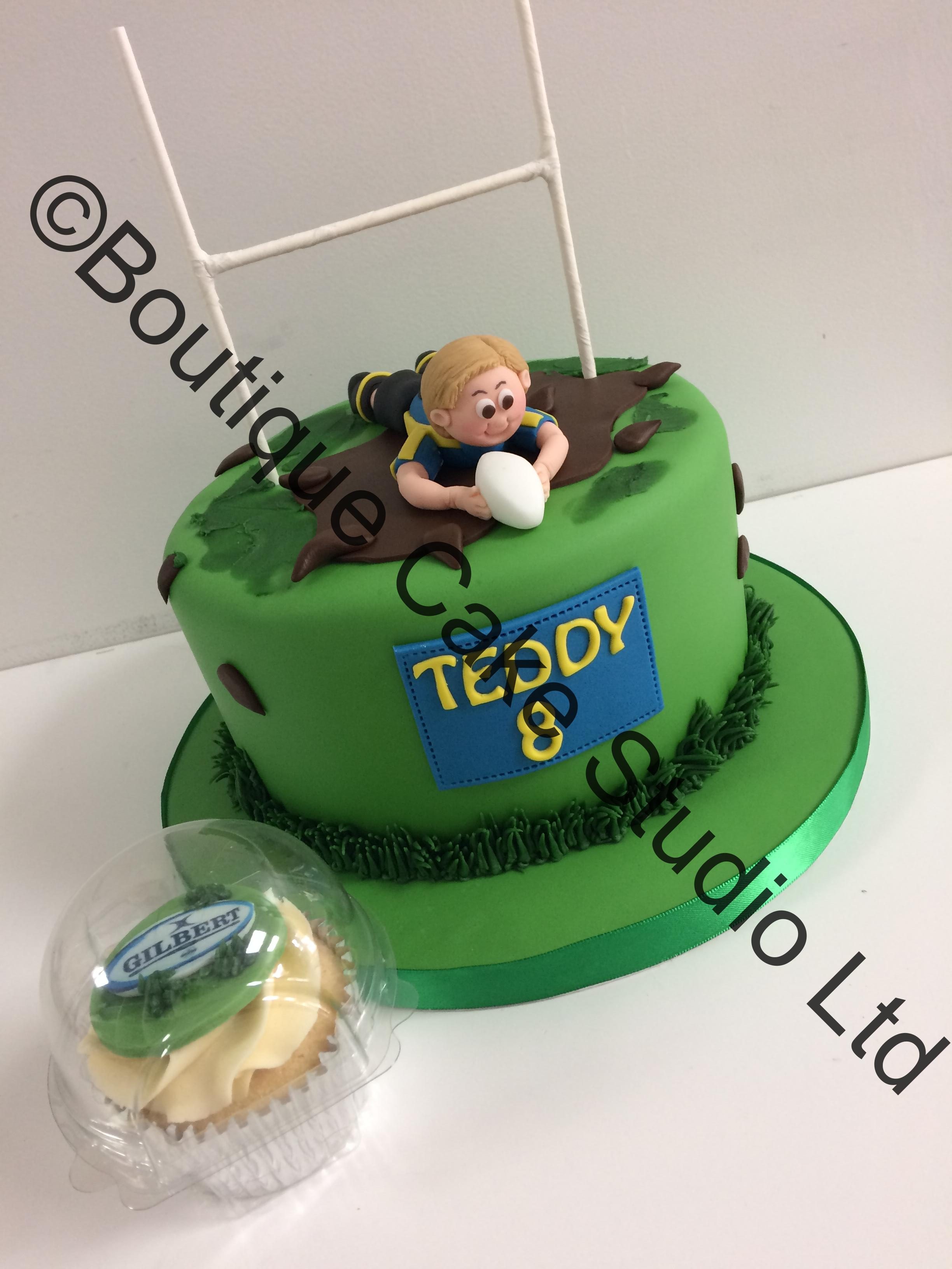 Rugby themed cake with model