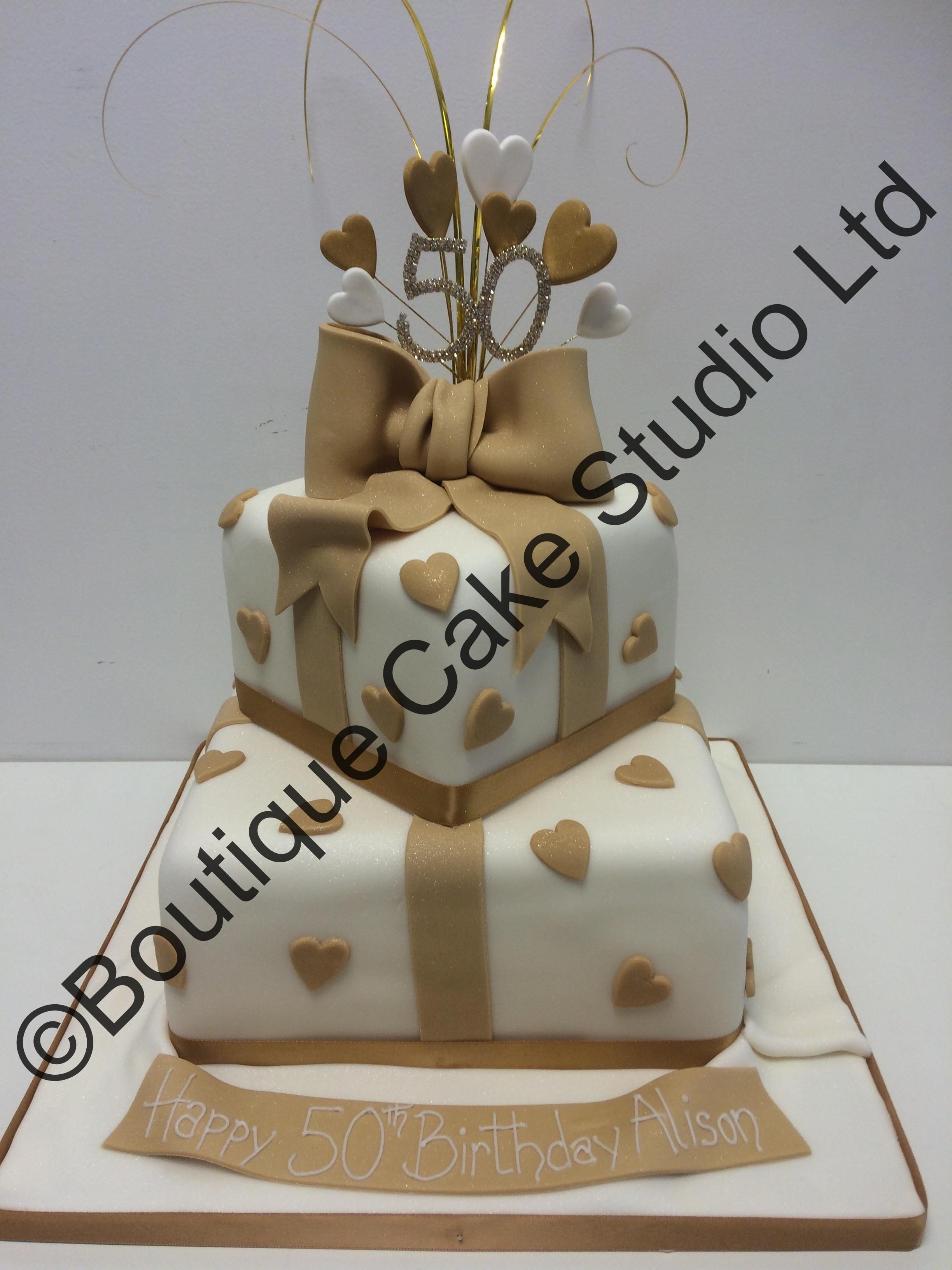 Ivory and Gold Stacked Parcel Cake
