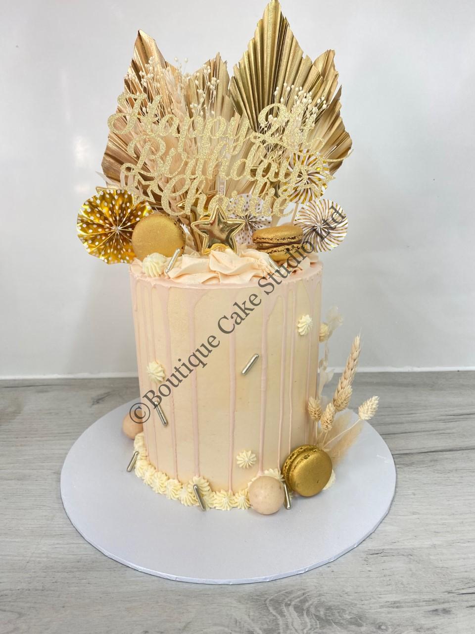 Neutral Buttercream Drip Cake with Palm Leaves
