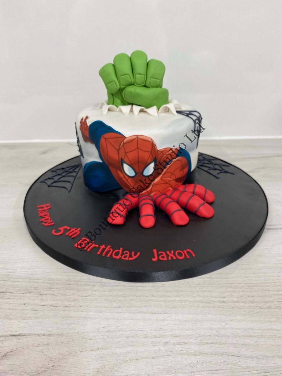 Spiderman themed cake with Hulk fist